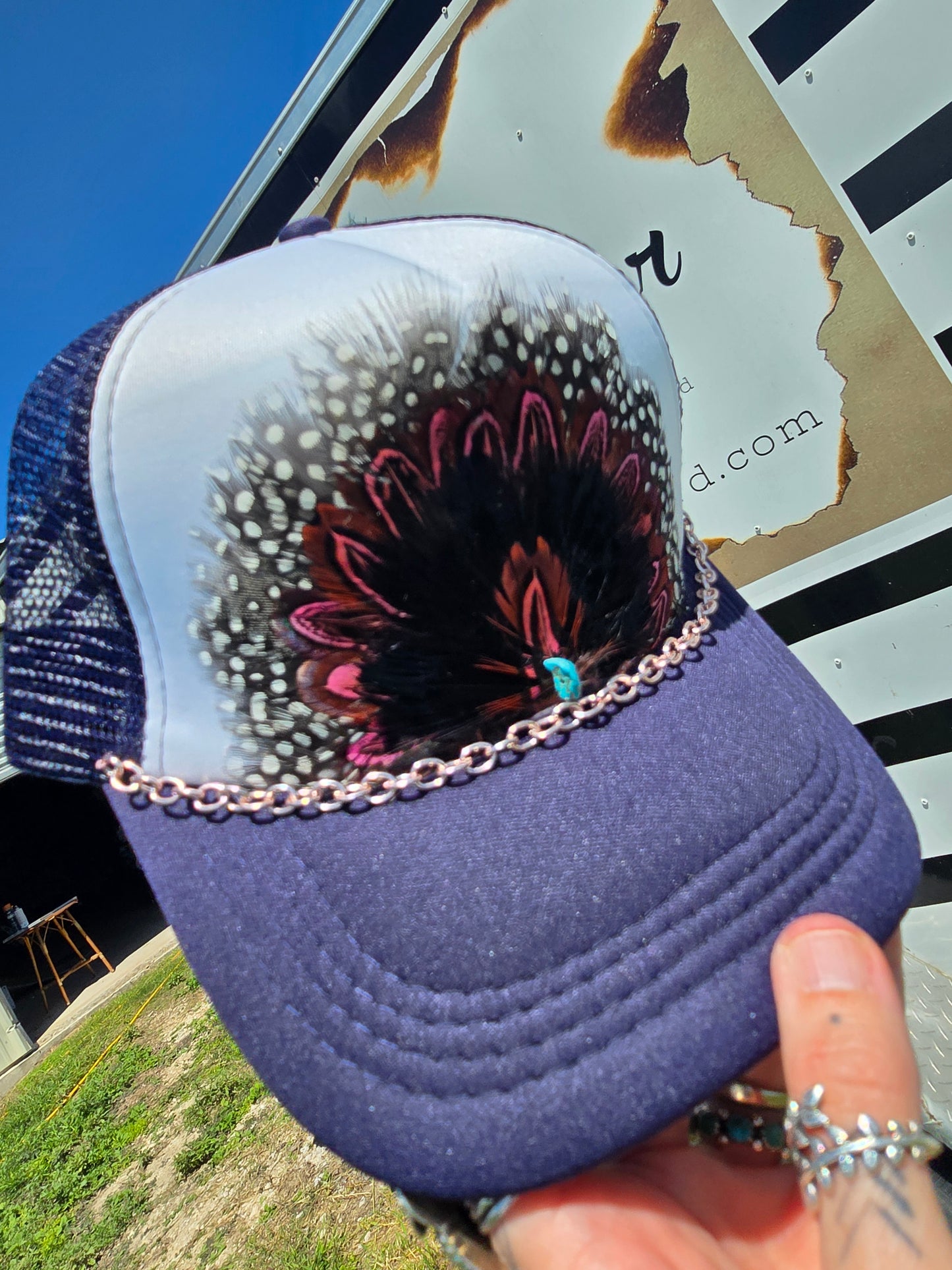 Feathered & Chained Trucker Caps